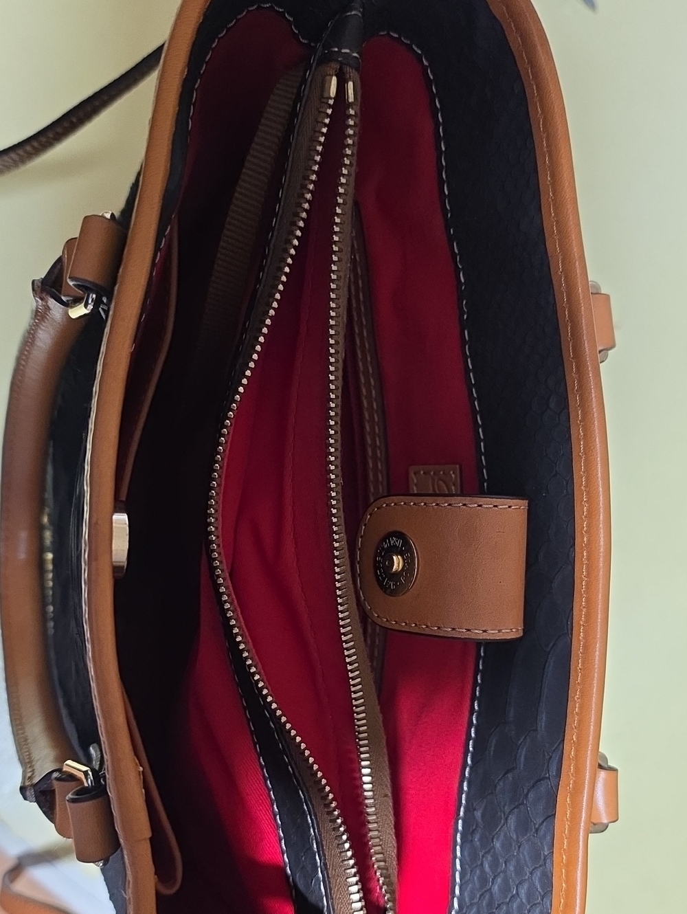 Dooney & Bourke Black Textured Satchel with Tan Trim and Red Interior